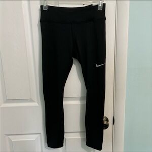 NWT Nike Dri Fit black mid rise crop length leggings
